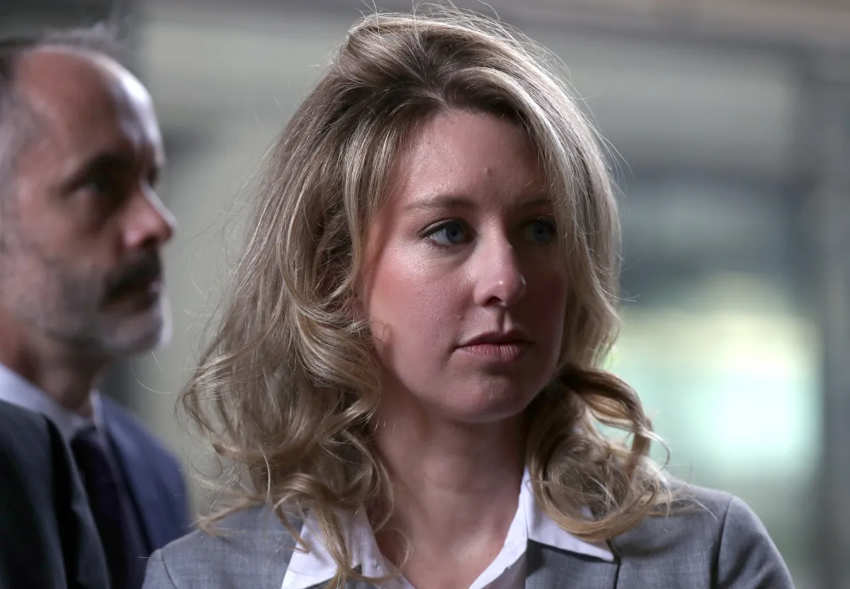Pretend you’re sitting at Elizabeth Holmes’ desk on this weirdly detailed website